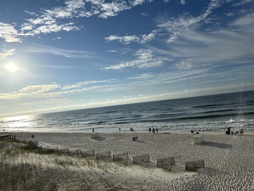 Wide view of Gulf Shores beach with sand dunes