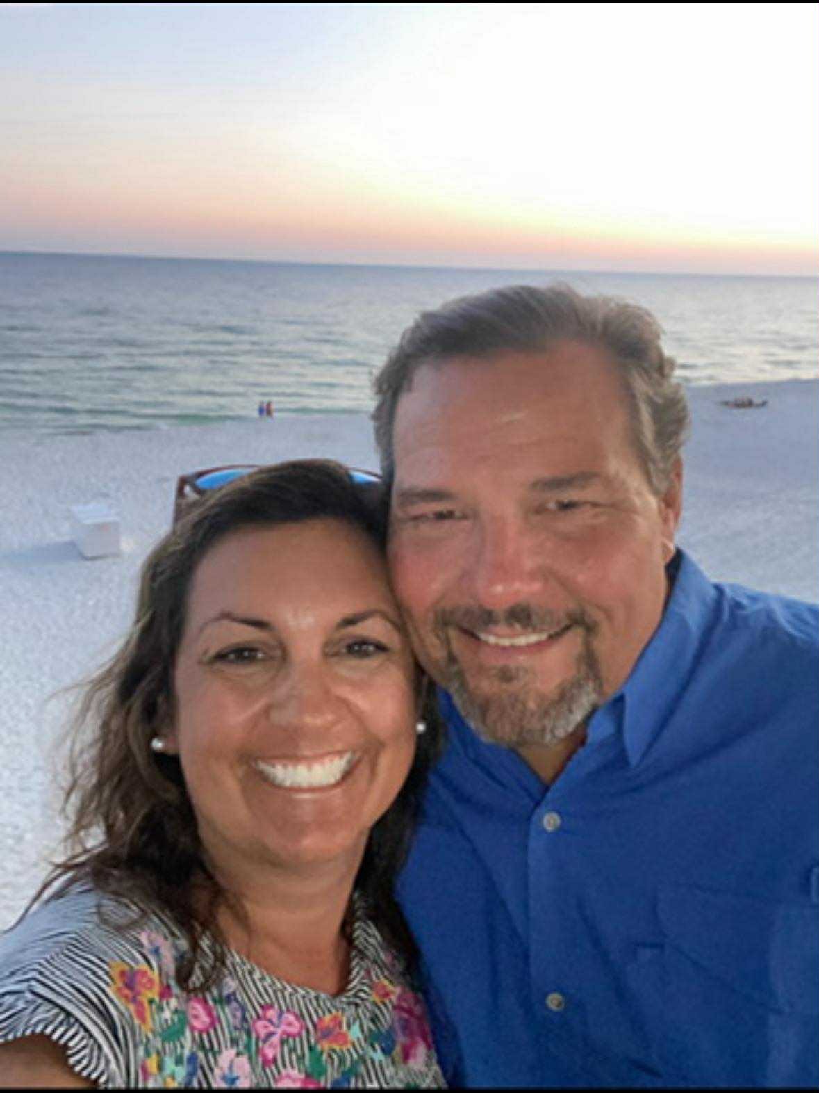Your friendly hosts at the beach during sunset
