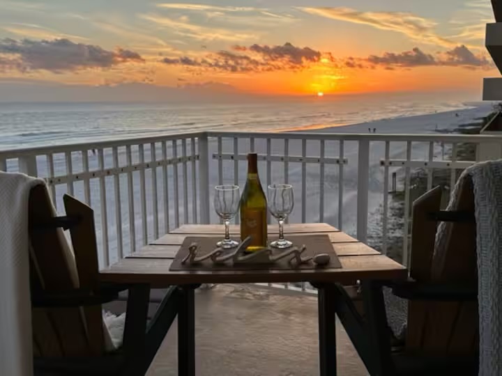 Romantic sunset view from the balcony with wine setup